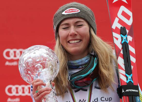 ALPINE SKIING - FIS WC Meribel MERIBEL,FRANCE,21.MAR.15 - ALPINE SKIING - FIS World Cup Final, slalom, ladies, award ceremony for the slalom World Cup. Image shows Mikaela Shiffrin (USA). Keywords: crystal globe, trophy.