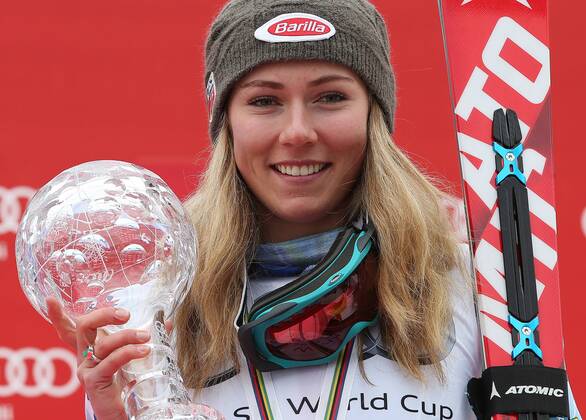ALPINE SKIING - FIS WC Meribel MERIBEL,FRANCE,21.MAR.15 - ALPINE SKIING - FIS World Cup Final, slalom, ladies, award ceremony for the slalom World Cup. Image shows Mikaela Shiffrin (USA). Keywords: crystal globe, trophy.