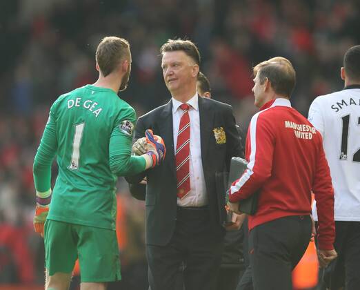 Louis van Gaal manager of Manchester United ManU thanks David De Gea of Manchester United - Barclays Premier League - Liverpool vs Manchester Utd - Anfield Stadium - Liverpool - England - 22nd March 2015 - Picture Simon Bellis Sportimage EDITORIAL USE ONLY. No use with unauthorised audio, video, data, fixture lists, club league logos or live services. Online in-match use limited to 120 images, no video emulation. No use in betting, games or single club league player publications.