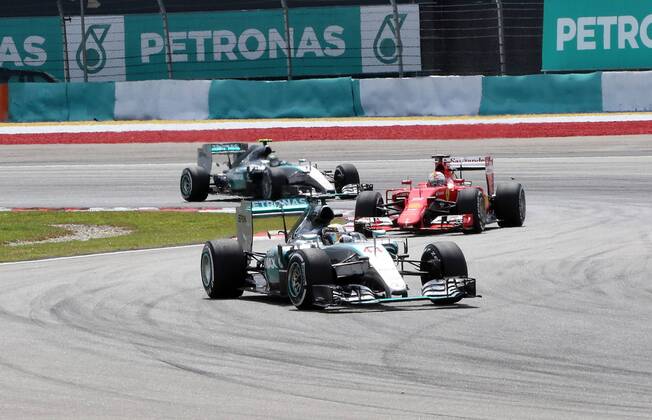 Lewis Hamilton; Mercedes Grand Prix, Sebastian Vettel, Scuderia Ferrari, Nico Rosberg; Mercedes Grand Prix, formula 1 GP, Malaysia in Kuala Lumpur Sepang 29.03.2015 Photo:mspb Thomas Melzer Lewis Hamilton; Sebastian Vettel, Nico Rosberg; formula 1 GP, Malaysia