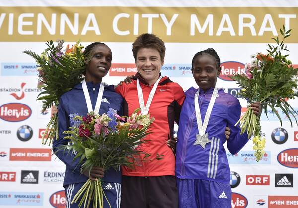 ATHLETICS - VCM 2015 VIENNA,AUSTRIA,12.APR.15 - ATHLETICS, RUNNING - Vienna City Marathon, award ceremony. Image shows Esther Chemtai (KEN), Maja Neuenschwander (SUI) and Agnes Mutune (KEN). GEPAxpictures xM.xHoermandinger 