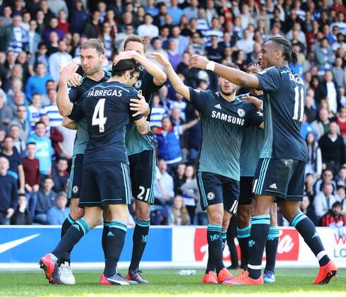 Chelsea s Cesc Fabregas celebrates scoring his sides opening goal Barclays Premier League- Queens Park Rangers vs Chelsea - Loftus Road - England - 12h April 2015 - Picture David Klein Sportimage EDITORIAL USE ONLY. No use with unauthorised audio, video, data, fixture lists, club league logos or live services. Online in-match use limited to 120 images, no video emulation. No use in betting, games or single club league player publications.