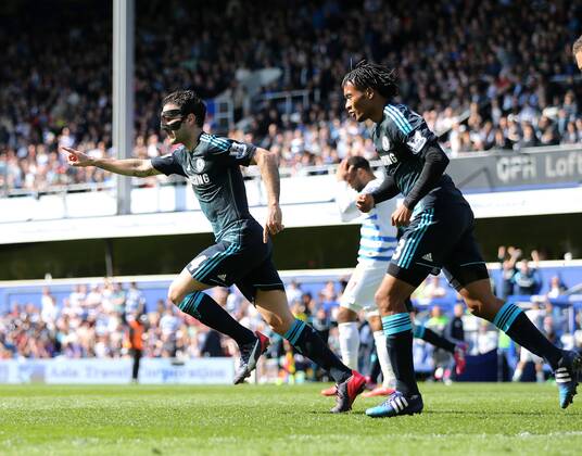Chelsea s Cesc Fabregas celebrates scoring his sides opening goal Barclays Premier League- Queens Park Rangers vs Chelsea - Loftus Road - England - 12h April 2015 - Picture David Klein Sportimage EDITORIAL USE ONLY. No use with unauthorised audio, video, data, fixture lists, club league logos or live services. Online in-match use limited to 120 images, no video emulation. No use in betting, games or single club league player publications.