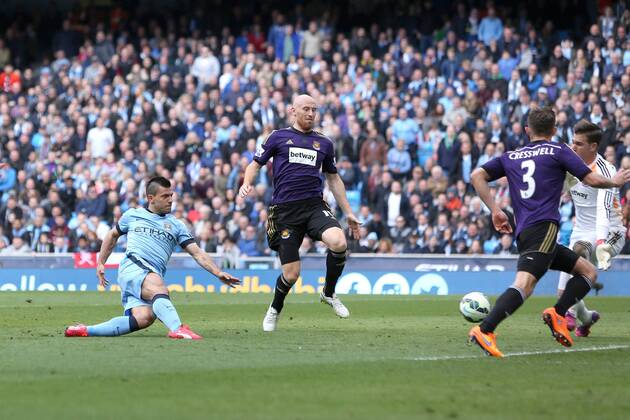 Sergio Aguero of Manchester City scores his sides second goal - Manchester City vs. West Ham United - Barclay s Premier League - Etihad Stadium - Manchester - 19 04 2015 Pic Philip Oldham Sportimage EDITORIAL USE ONLY. No use with unauthorised audio, video, data, fixture lists, club league logos or live services. Online in-match use limited to 120 images, no video emulation. No use in betting, games or single club league player publications.