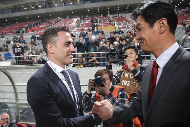 SEOUL, SOUTH KOREA - APRIL 21: (CHINA OUT) Fabio Cannavaro (L), head coach of Guangzhou Evergrande, shakes hands with Choi Yong-soo, head coach of FC Seoul, prior to the AFC Champions League Group H match between FC Seoul and Guangzhou Evergrande at Seoul World Cup Stadium on April 21, 2015 in Seoul, South Korea.  CFP466318925 