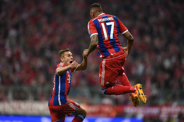 FUSSBALL CHAMPIONS LEAGUE SAISON 2014 2015 VIERTELFINALE RUECKSPIEL FC Bayern Muenchen - FC Porto 21.03.2015 Torjubel: Rafinha (li) und Jerome Boateng (re, beide FC Bayern Muenchen)) 