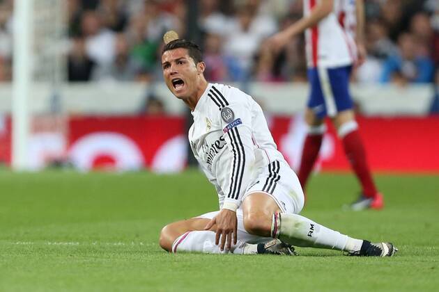 Cristiano Ronaldo of Real Madrid reacts as he fails to win a free kick - Real Madrid vs. Atletico Madrid - UEFA Champions League - Quarter Final Second Leg - Santiago Bernabeu - Madrid - 22 04 2015 Pic Philip Oldham Sportimage EDITORIAL USE ONLY. No use with unauthorised audio, video, data, fixture lists, club league logos or live services. Online in-match use limited to 120 images, no video emulation. No use in betting, games or single club league player publications.