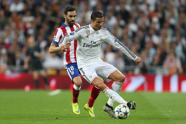 Jesus Gamez of Atletico and Cristiano Ronaldo of Real Madrid - Real Madrid vs. Atletico Madrid - UEFA Champions League - Quarter Final Second Leg - Santiago Bernabeu - Madrid - 22 04 2015 EDITORIAL USE ONLY. No use with unauthorised audio, video, data, fixture lists, club league logos or live services. Online in-match use limited to 120 images, no video emulation. No use in betting, games or single club league player publications.