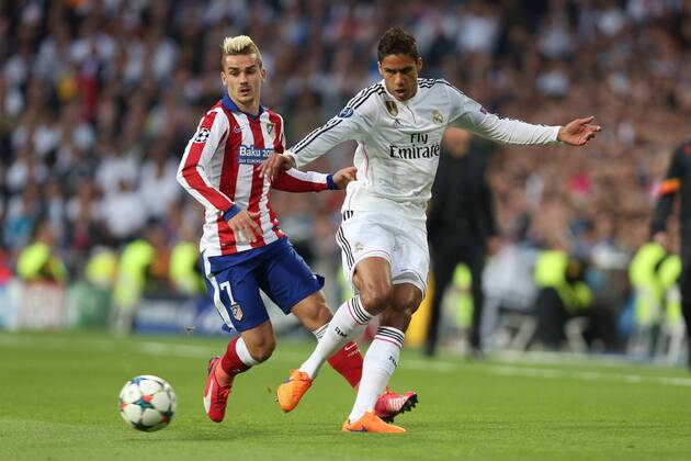 Antoine Griezmann of Atletico and Raphael Varane of Real Madrid - Real Madrid vs. Atletico Madrid - UEFA Champions League - Quarter Final Second Leg - Santiago Bernabeu - Madrid - 22 04 2015 EDITORIAL USE ONLY. No use with unauthorised audio, video, data, fixture lists, club league logos or live services. Online in-match use limited to 120 images, no video emulation. No use in betting, games or single club league player publications.
