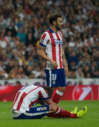 Atletico de Madrid Midfielder, Jorge Resurreccion Merodio, number 6 . Atletico de Madrid Defender, Jesus Gamez Duarte, number 18. Round 1 4 of the CHAMPIONS league, soccer match between Real Madrid - Atletico de Madrid at the Santiago Bernabeu estadium, Madrid - Spain by April 22, 2015. PHOTOxGregorioxLopez. 