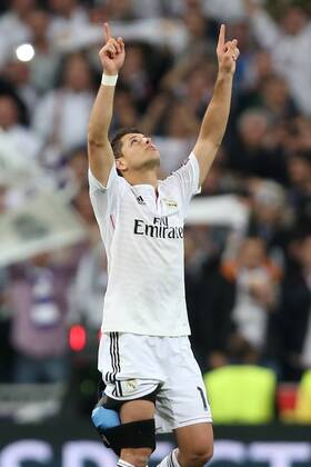 Javier Hernandez of Real Madrid celebrates at full time with an ice pack on his leg - Real Madrid vs. Atletico Madrid - UEFA Champions League - Quarter Final Second Leg - Santiago Bernabeu - Madrid - 22 04 2015 Pic Philip Oldham Sportimage EDITORIAL USE ONLY. No use with unauthorised audio, video, data, fixture lists, club league logos or live services. Online in-match use limited to 120 images, no video emulation. No use in betting, games or single club league player publications.