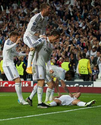 Real Madrid Forward, Javier Chicharito Hernandez, number 14 celebrates after scoring a goal (1,0). Round 1 4 of the CHAMPIONS league, soccer match between Real Madrid - Atletico de Madrid at the Santiago Bernabeu estadium, Madrid - Spain by April 22, 2015. PHOTOxGregorioxLopez. 