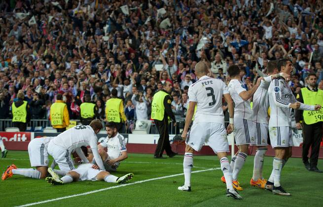 Real Madrid Forward, Javier Chicharito Hernandez, number 14 celebrates after scoring a goal (1,0). Round 1 4 of the CHAMPIONS league, soccer match between Real Madrid - Atletico de Madrid at the Santiago Bernabeu estadium, Madrid - Spain by April 22, 2015. PHOTOxGregorioxLopez. 