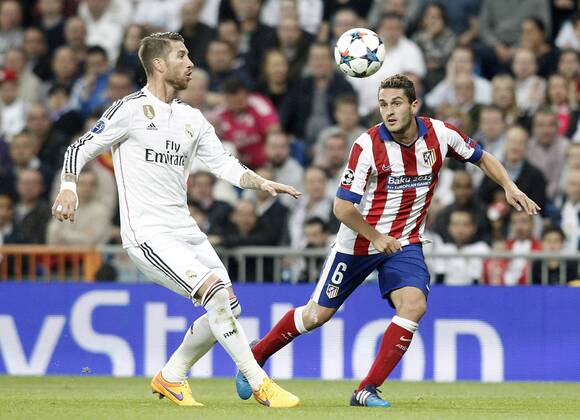Aktuell Fußball, Champions League, Real Madrid - Atletico Madrid Real Madrid s Sergio Ramos (l) and Atletico de Madrid s Koke Resurrecccion during Champions League 2014 2015 Quarter-finals 2nd leg match.April 22,2015.  (2015042268)