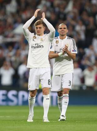 Pepe and Toni Kroos of Real Madrid wave to fans - Real Madrid vs. Atletico Madrid - UEFA Champions League - Quarter Final Second Leg - Santiago Bernabeu - Madrid - 22 04 2015 Pic Philip Oldham Sportimage EDITORIAL USE ONLY. No use with unauthorised audio, video, data, fixture lists, club league logos or live services. Online in-match use limited to 120 images, no video emulation. No use in betting, games or single club league player publications.