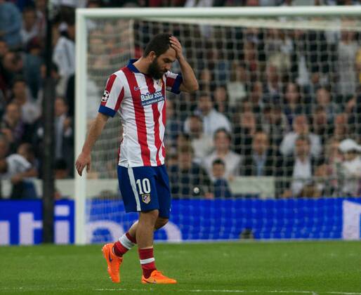 Atletico de Madrid Midfielder, Arda Turan, number 10 . Round 1 4 of the CHAMPIONS league, soccer match between Real Madrid - Atletico de Madrid at the Santiago Bernabeu estadium, Madrid - Spain by April 22, 2015. PHOTO: Gregorio Lopez. 