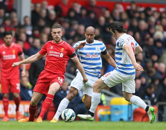 Jordan Henderson of Liverpool tussles with Karl Henry of QPR - Barclays Premier League - Liverpool vs QPR - Anfield Stadium - Liverpool - England - 2nd May 2015 - Picture Simon Bellis Sportimage EDITORIAL USE ONLY. No use with unauthorised audio, video, data, fixture lists, club league logos or live services. Online in-match use limited to 120 images, no video emulation. No use in betting, games or single club league player publications.