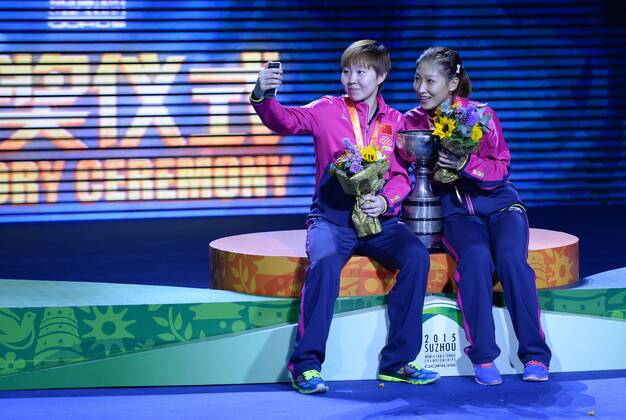 SUZHOU, CHINA - MAY 03: (CHINA OUT) Liu Shiwen and Zhu Yuling of China pose with their trophy after winning women s doubles final match against Ding Ning and Li Xiaoxia of China on day eight of the 2015 World Table tennis Tischtennis Championships at the Suzhou International Expo Center on May 3, 2015 in Suzhou, China.  CFP466952910 