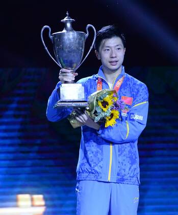 SUZHOU, CHINA - MAY 03: (CHINA OUT) Ma Long of China poses with his trophy after winning men s singles final match against Fang Bo of China on day eight of the 2015 World Table tennis Tischtennis Championships at the Suzhou International Expo Center on May 3, 2015 in Suzhou, China.  CFP466952935 