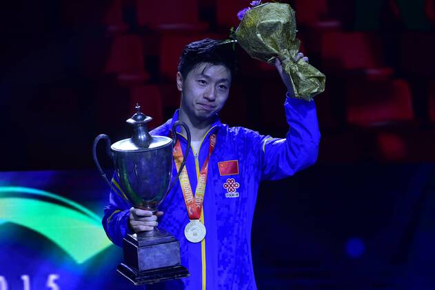 SUZHOU, CHINA - MAY 03: (CHINA OUT) Ma Long of China poses with his trophy after winning men s singles final match against Fang Bo of China on day eight of the 2015 World Table tennis Tischtennis Championships at the Suzhou International Expo Center on May 3, 2015 in Suzhou, China.  CFP466952940 