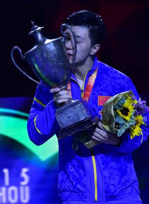 SUZHOU, CHINA - MAY 03: (CHINA OUT) Ma Long of China poses with his trophy after winning men s singles final match against Fang Bo of China on day eight of the 2015 World Table tennis Tischtennis Championships at the Suzhou International Expo Center on May 3, 2015 in Suzhou, China.  CFP466952943 