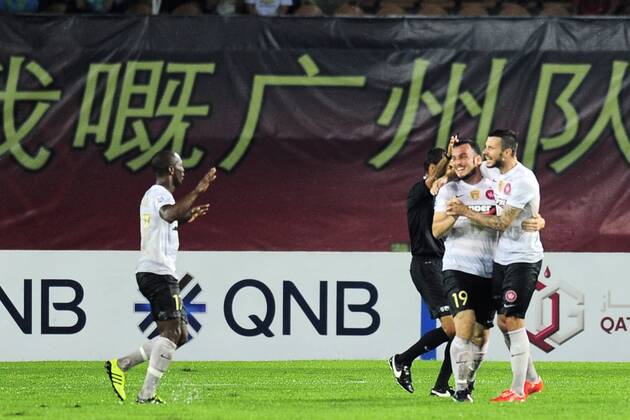 GUANGZHOU, CHINA - MAY 05: (CHINA OUT) Mark Bridge 19 of Western Sydney Wanderers celebrates with team mates after scoring his team s first goal during the AFC Asian Champions League Group H match between Guangzhou Evergrande and Western Sydney Wanderers at Tianhe Sports Center on May 5, 2015 in Guangzhou, China.  CFP467029049 
