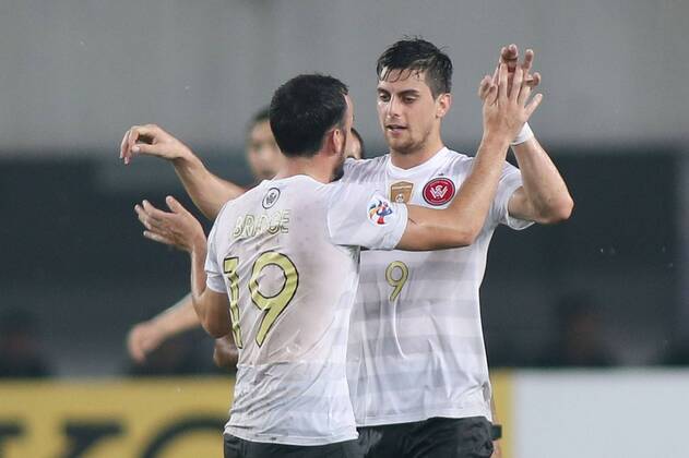 GUANGZHOU, CHINA - MAY 05: (CHINA OUT) Mark Bridge 19 of Western Sydney Wanderers celebrates with team mates after scoring his team s first goal during the AFC Asian Champions League Group H match between Guangzhou Evergrande and Western Sydney Wanderers at Tianhe Sports Center on May 5, 2015 in Guangzhou, China.  CFP467029055 