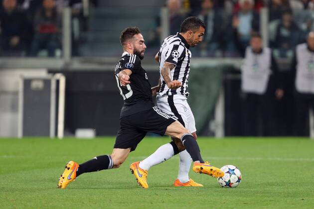 Daniel Carvajal of Real Madrid brings down Juventus Carlos Tevez to concede a penalty - Juventus vs. Real Madrid - UEFA Champion s League - Semi Final First Leg - Juventus Stadium - Turin - 05 05 2015 Pic Philip Oldham Sportimage EDITORIAL USE ONLY. No use with unauthorised audio, video, data, fixture lists, club league logos or live services. Online in-match use limited to 120 images, no video emulation. No use in betting, games or single club league player publications.