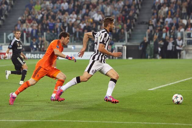Juventus Fernando Llorente finds Iker Casillas of Real Madrid out of position but fails to capitalise - Juventus vs. Real Madrid - UEFA Champion s League - Semi Final First Leg - Juventus Stadium - Turin - 05 05 2015 Pic Philip Oldham Sportimage EDITORIAL USE ONLY. No use with unauthorised audio, video, data, fixture lists, club league logos or live services. Online in-match use limited to 120 images, no video emulation. No use in betting, games or single club league player publications.