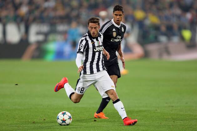 Juventus Claudio Marchisio and Raphael Varane of Real Madrid - Juventus vs. Real Madrid - UEFA Champion s League - Semi Final First Leg - Juventus Stadium - Turin - 05 05 2015 Pic Philip Oldham Sportimage EDITORIAL USE ONLY. No use with unauthorised audio, video, data, fixture lists, club league logos or live services. Online in-match use limited to 120 images, no video emulation. No use in betting, games or single club league player publications.