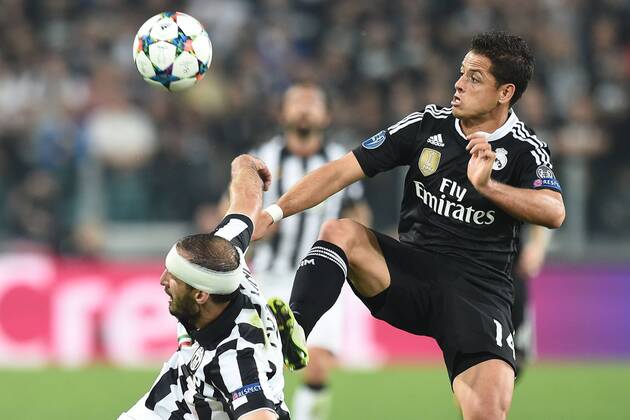 Aktuell Fußball, Champions League, Giorgio Chiellini von Juventus Turin spielt nach Verletzung mit Kopfverband weiter 05.05.2015, Turin - UEFA Champions League 2014 2015 - Juventus Turin vs Real Madrid - Javier Hernandez-Giorgio Chiellini 