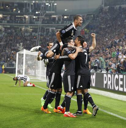 First leg of 1 2 Champions League match between Juventus and Real Madrid. In this picture, Cristiano Ronaldo celebrates his goal with James Rodriguez, Pepe. xFOTOxCHEMAxREYx 