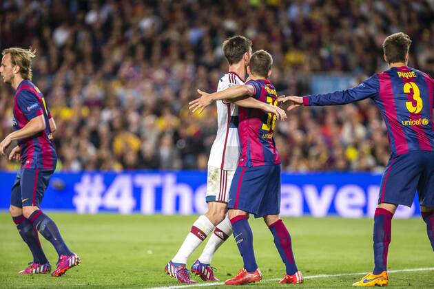 BARCELONA, SPAIN - March 6: Xabi Alonso and Jordi Alba (c) during the match of UEFA Champions League Semi final first leg between FC Barcelona Barca and Bayern Munchen at the Camp Nou stadium on March 6, 2015 in Barcelona, Spain. (Photo by Mikel Trigueros Urbanandsport Cordon Press) 