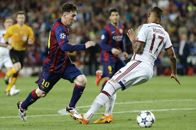 BARCELONA, May 6, 2015 -- Barcelona s Argentine forward Lionel Messi (L) vies with FC FC Bayern München s German defender Jerome Boateng during their first round match of semifinal at the 2014-2015 UEFA Champions League at Camp Nou Stadium in Barcelona, Spain, May 6, 2015. Barcelona won 3-0. ) (SP)SPAIN-BARCELONA-SOCCER-UEFA CHAMPIONS LEAGUE-SEMIFINAL-FCB VS FC FC Bayern München PauxBarrena 