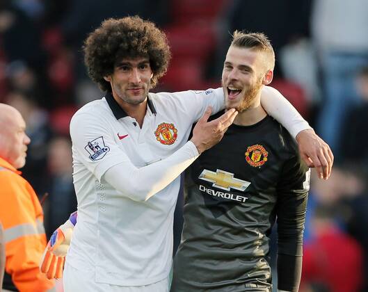 Manchester United ManU s Marouane Fellaini celebrates at the final whistle with David De Gea Barclays Premier League - Crystal Palace vs Manchester United- Selhurst Park - England - 9th May 2015 - Picture David Klein Sportimage EDITORIAL USE ONLY. No use with unauthorised audio, video, data, fixture lists, club league logos or live services. Online in-match use limited to 120 images, no video emulation. No use in betting, games or single club league player publications.