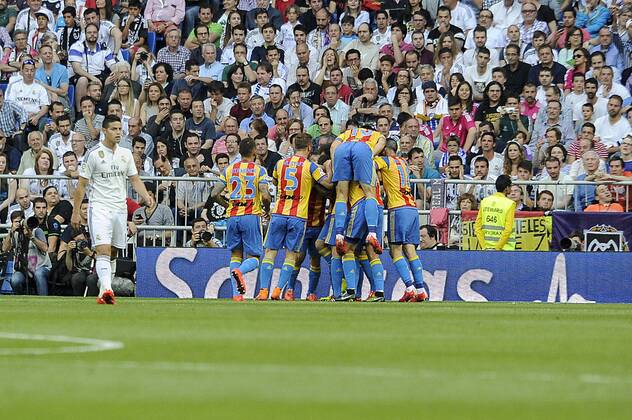 Valencia s players celebrate a goal during 2014-15 La Liga match between Real Madrid and Valencia at Santiago Bernabeu stadium in Madrid, Spain. May 09, 2015. (20150509037)