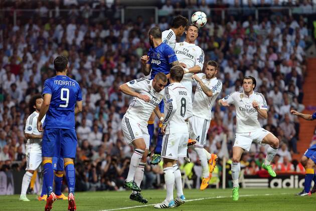 May 13, 2015 - Madrid, Spain - CRISTIANO RONALDO of Real Madrid CF jumps for the ball during the UEFA Champions League semi final second leg match between Real Madrid CF and Juventus at the Santiago Bernabeu stadium in Madrid, Spain. UEFA Champions League 2015 - Real Madrid CF v Juventus - ZUMAg147