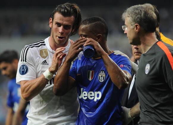 Real Madrid Midfielder, Gareth Frank Bale - BALE, number 11 . Juventus Defender Patrice Evra - VIDAL, number 23. Round semifinal of the CHAMPIONS league Basketball match between Real Madrid - Juventus at the Santiago Bernabeu estadium Madrid - Spain by May 13 2015. 