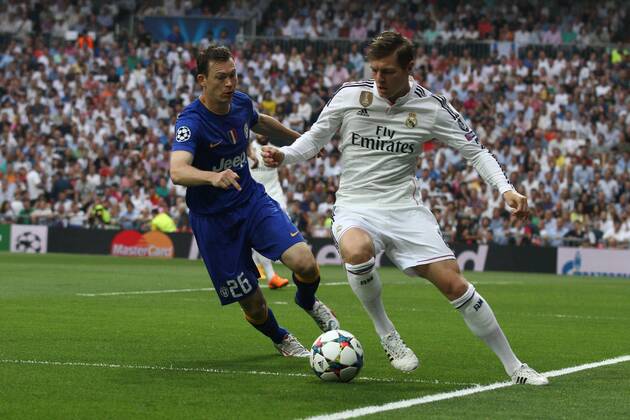 May 13, 2015 - Madrid, Spain - Real Madrid midfielder Toni Kroos (8) vies with Juventus defender Stephan Lichtsteiner (26) during the Uefa Champions League semi finals football match REAL MADRID - JUVENTUS on 13 05 15 at the Estadio Santiago Bernabeu in Madrid, Spain. Copyright 2015 Matteo Bottanelli Real vs Juve  - ZUMAn230