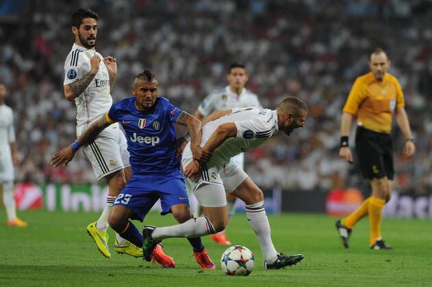Juventus Midfielder, Arturo Vidal - VIDAL, number 23 celebrates after scoring a goal (1,1). Real Madrid Forward, Karim Benzema - BENZEMA, number 9. Real Madrid Midfielder, Francisco Roman Alarcon - ISCO, number 23. Round semifinal of the CHAMPIONS league Basketball match between Real Madrid - Juventus at the Santiago Bernabeu estadium Madrid - Spain by May 13 2015. 