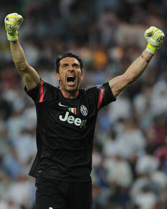 Juventus Forward, Alvaro Morata - MORATA, number 9 celebrates after scoring a goal (1,1). Juventus Goalkeeper, Gianluigi Buffon - Buffon, number 1. Round semifinal of the CHAMPIONS league Basketball match between Real Madrid - Juventus at the Santiago Bernabeu estadium Madrid - Spain by May 13 2015. 