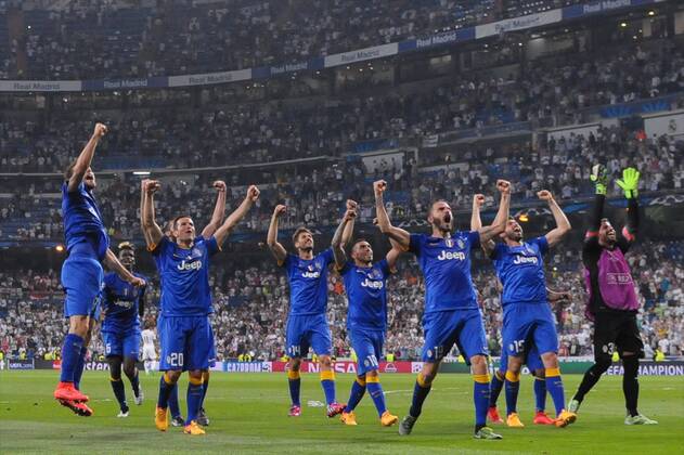 Juventus Forward, Alvaro Morata - MORATA, number 9 celebrates after scoring a goal (1,1). Juventus Goalkeeper, Gianluigi Buffon - Buffon, number 1. Juventus Midfielder, Romulo Souza Orestes Caldeira - ORESTES, number 2. Juventus Defender, Giorgio Chiellini - CHIELLINI, number 3. Juventus Defender, Martin Caceres - CACERES, number 4. Juventus Defender, Angelo Ogbonna - OGBONNA, number 5. Juventus Midfielder, Paul Pogba - POGBA, number 6. Juventus Midfielder, Simone Pepe - PEPE, number 7. Juventus Midfielder, Claudio Marchisio - MARCHISIO, number 8. Juventus Forward, Carlos Tevez - TEVEZ, number 10. Juventus Midfielder, Kingsley Coman - COMAN, number 11. Juventus Forward, Fernando Llorente - Llorente, number 14. Juventus Defender, Adrea Barzagli - BARZAGLI, number 15. Juventus Defender, Paolo De Ceglie - DE CEGLIE, number 17. Juventus Defender, Leonardo Bonucci - BONUCCI, number 19. Juventus Midfielder, Simone Padoin - PADOIN, number 20. Juventus Midfielder, Andrea Pirlo - PIRLO, number 21. Juventus Midfielder, Kwadwo Asamoah - ASAMOAH, number 22. Juventus Midfielder, Arturo Vidal - VIDAL, number 23. Juventus Defender, Stephan Lichtsteiner - Lichtsteiner, number 26. Juventus Midfielder, Stefano Sturaro - STURARO, number 27. Juventus Goalkeeper, Marco Storari - Marco Storari, number 30. Juventus Forward, Alessandro Matri - MATRI, number 32. Juventus Defender, Patrice Evra - EVRA, number 33. Juventus Goalkeeper, Rubens Fernando Moedim - Moedim, number 34. Juventus Midfielder, Roberto Maximiliano Pereyra - PEREYRA, number 37. Juventus Defender, Luca Marrone - MARRONE, number 39. Round semifinal of the CHAMPIONS league Basketball match between Real Madrid - Juventus at the Santiago Bernabeu estadium Madrid - Spain by May 13 2015.