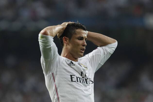 Real Madrid s Cristiano Ronaldo reacts during the Champions League semi final soccer match between Real Madrid and Juventus at Santiago Bernabeu stadium in Madrid, Spain. May 13, 2015.  (2015051300023)