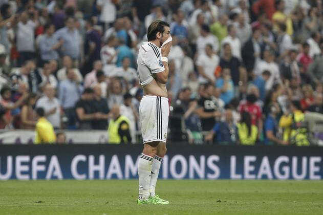Real Madrid s Gareth Bale regrets the defeat after the Champions League semi final soccer match between Real Madrid and Juventus at Santiago Bernabeu stadium in Madrid, Spain. May 13, 2015.  (2015051300064)