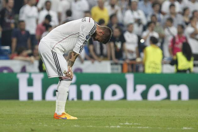 Real Madrid s Sergio Ramos regrets the defeat after the Champions League semi final soccer match between Real Madrid and Juventus at Santiago Bernabeu stadium in Madrid, Spain. May 13, 2015.  (2015051300065)