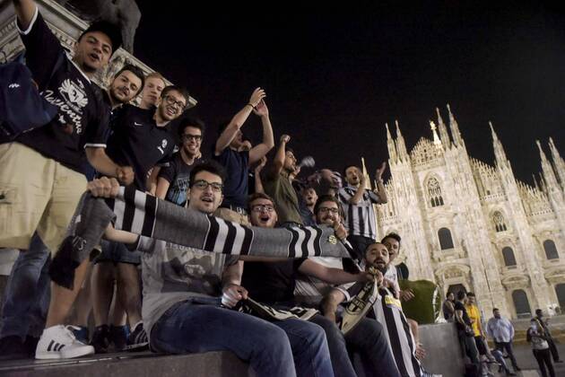 Milan, Juventus fans celebrating . Juventus won and qualify for the Champions league final in Berlin 