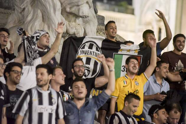 Milan, Juventus fans celebrating . Juventus won and qualify for the Champions league final in Berlin  x