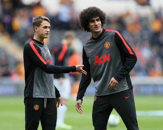 Adnan Januzaj of Manchester United ManU warms up with Mauroane Fellaini of Manchester United - Barclays Premier League - Hull City vs Manchester Utd - KC Stadium - Hull - England - 24th May 2015 - Picture Simon Bellis Sportimage EDITORIAL USE ONLY. No use with unauthorised audio, video, data, fixture lists, club league logos or live services. Online in-match use limited to 120 images, no video emulation. No use in betting, games or single club league player publications.