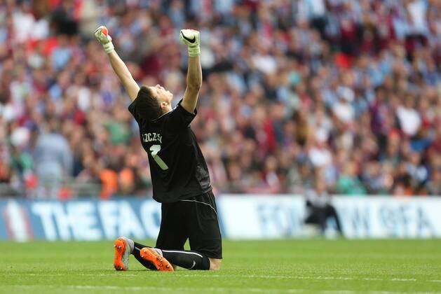 Arsenal s Wojciech Szczesny celebrates his sides second goal - Arsenal vs. Aston Villa - FA Cup Final - Wembley Stadium - London - 30 05 2015 Pic Philip Oldham Sportimage EDITORIAL USE ONLY. No use with unauthorised audio, video, data, fixture lists, club league logos or live services. Online in-match use limited to 120 images, no video emulation. No use in betting, games or single club league player publications.
