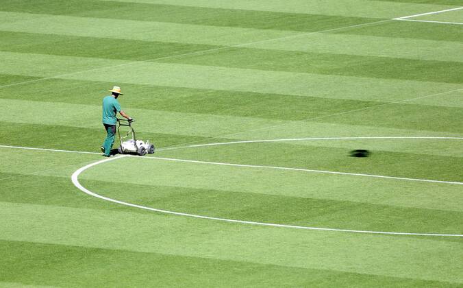 A general view as a groundsman puts the finishing touches to the white pitch markings - Juventus vs. Barcelona - Champion s League Final - Olympic Stadium - Berlin - Germany - 05 06 2015 Pic Philip Oldham Sportimage EDITORIAL USE ONLY. No use with unauthorised audio, video, data, fixture lists, club league logos or live services. Online in-match use limited to 120 images, no video emulation. No use in betting, games or single club league player publications.